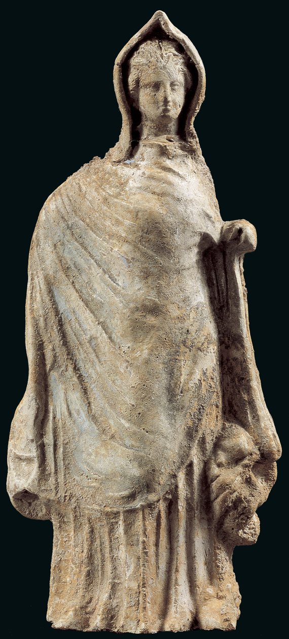 Figurine of a woman wearing a chiton and a himation covering her head, possibly from Myrina, Asia Minor, 250-200 BC by Greek