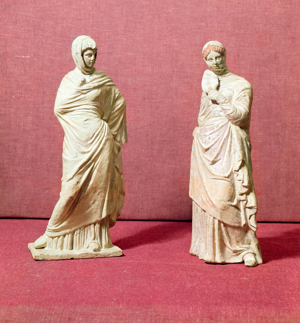 Two statues of standing women, from Tanagra by Greek School