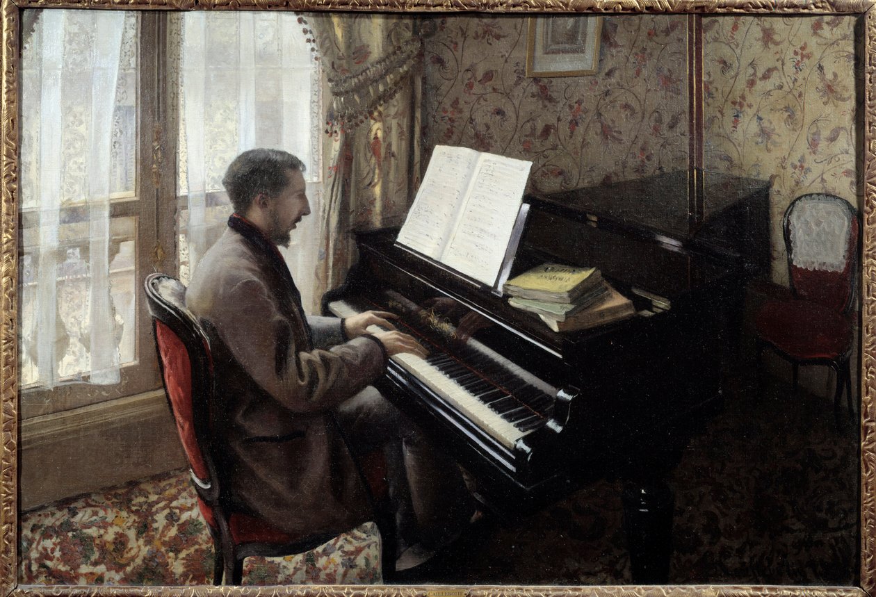 Young man playing piano by Gustave Caillebotte