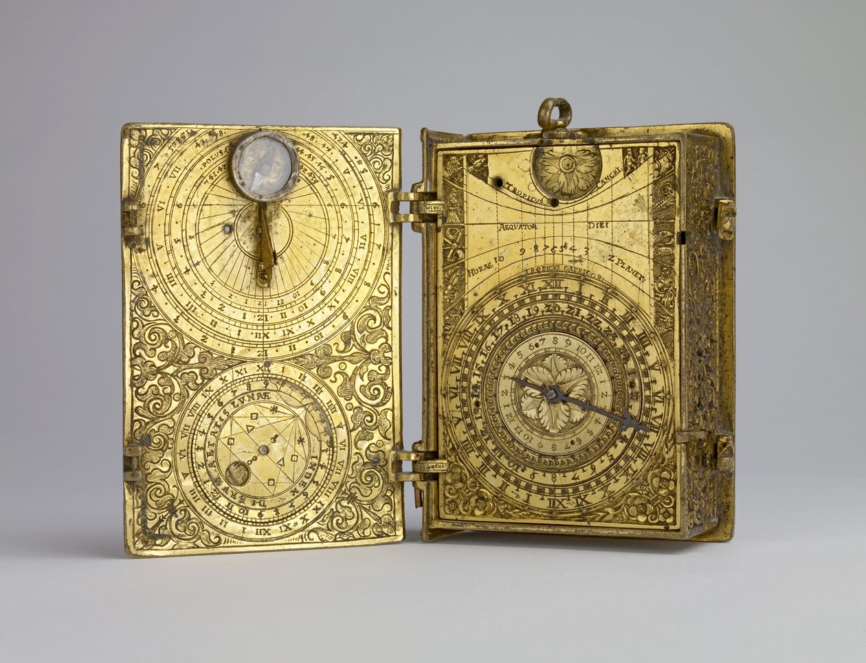 Gilt-Brass Cased Clock-Watch with Alarm, Sundials and Lunar Volvelle in the Form of a Book, c. 1580 by Hans Kock