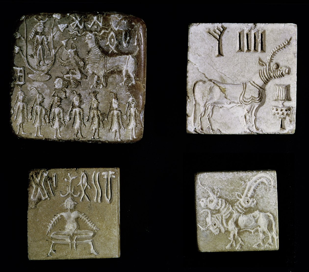 Four seals depicting mythological animals, from Mohenjo-Daro, Indus Valley, Pakistan, 3000-1500 BC by Harappan