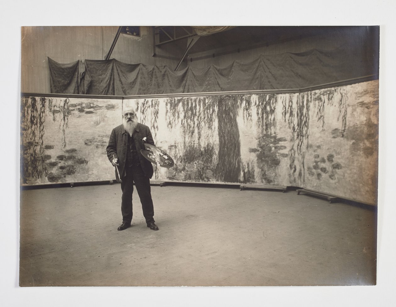 Claude Monet with his Palette in Front of his Work 