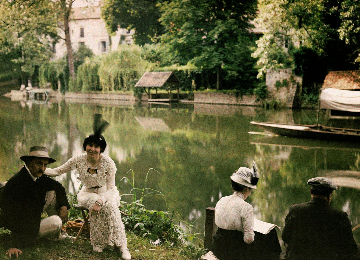 Meal on the Banks of the River at Montigny, France by Henri Chouanard