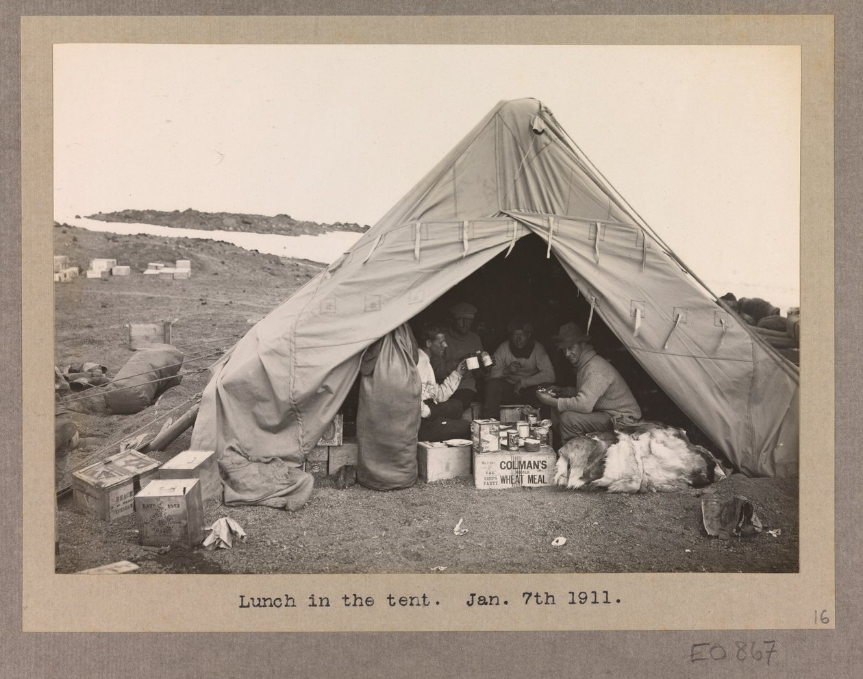 Four Expedition Members Having Lunch in a Tent by Herbert Ponting