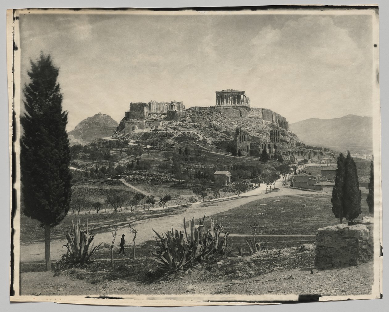 View of the Acropolis (walking man in foreground) by Hippolyte Petitjean