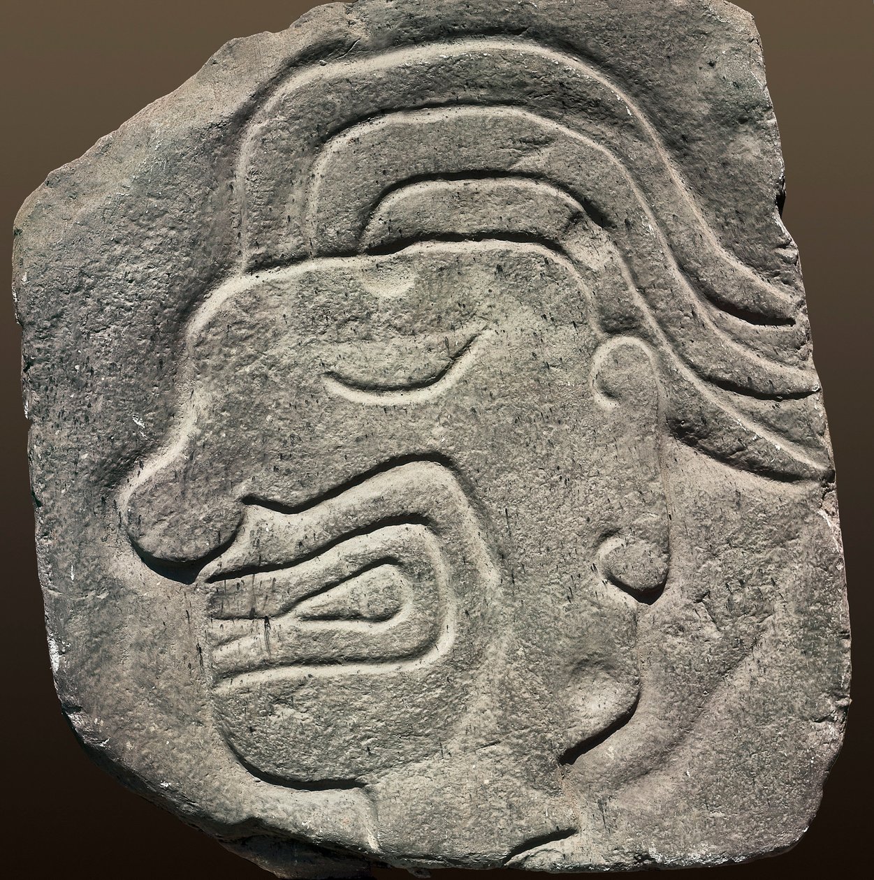 Incan relief representing a face in profile by Incan