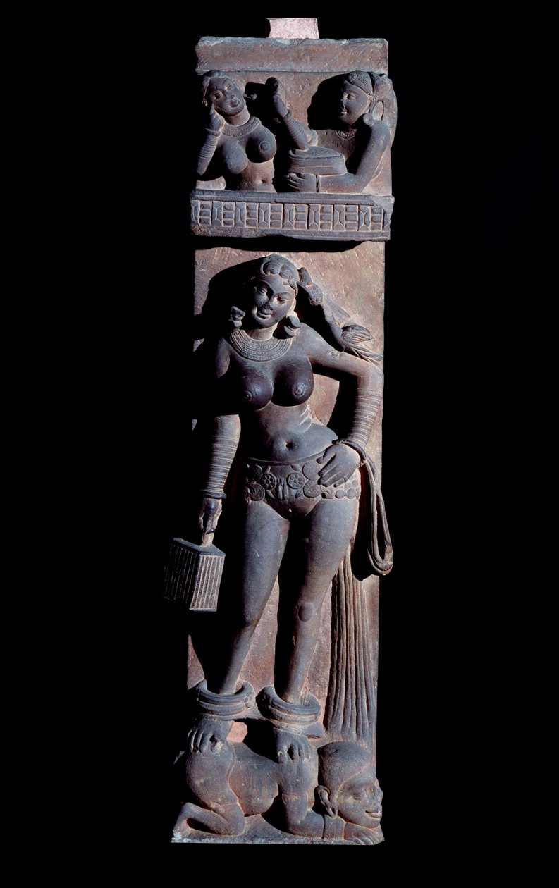 Representation of a Yakshini spirit of nature, holding a cage and a parrot, she stands on a dwarf. Sculpture by Mathura, sandstone, 2nd century by Indian School