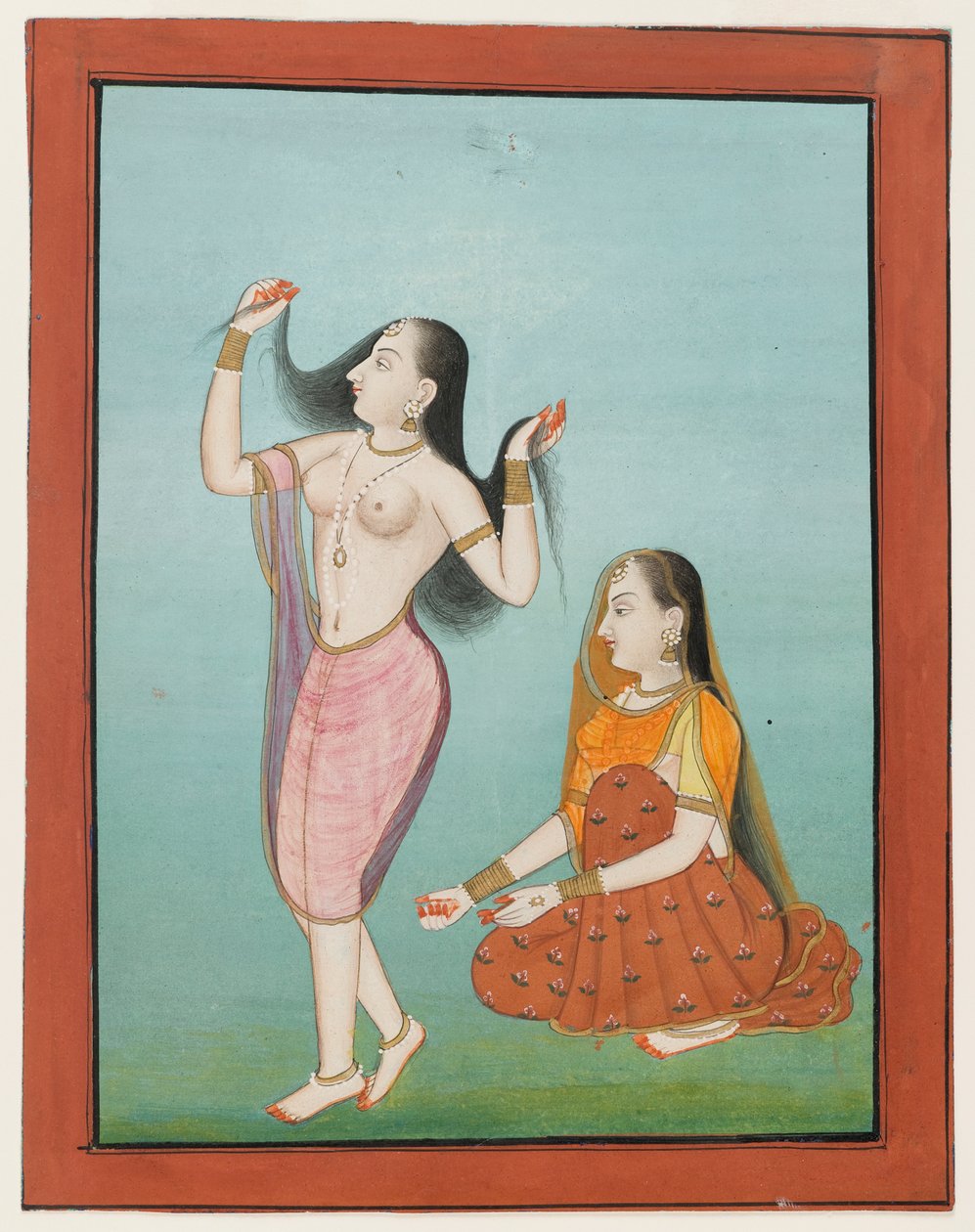 Miniature painting of a lady at her toilette by Indian School