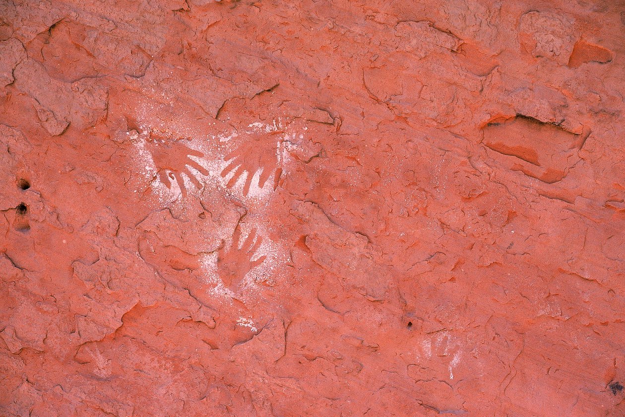 Ancient Anasazi rock art, handprint in Grand Gulch, Utah by Ira Block