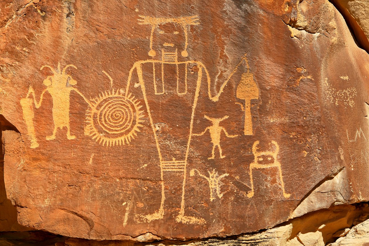 Near Vernal, UT at McKee Springs, Fremont petroglyphs showing warriors holding trophy heads., 2005 by Ira Block