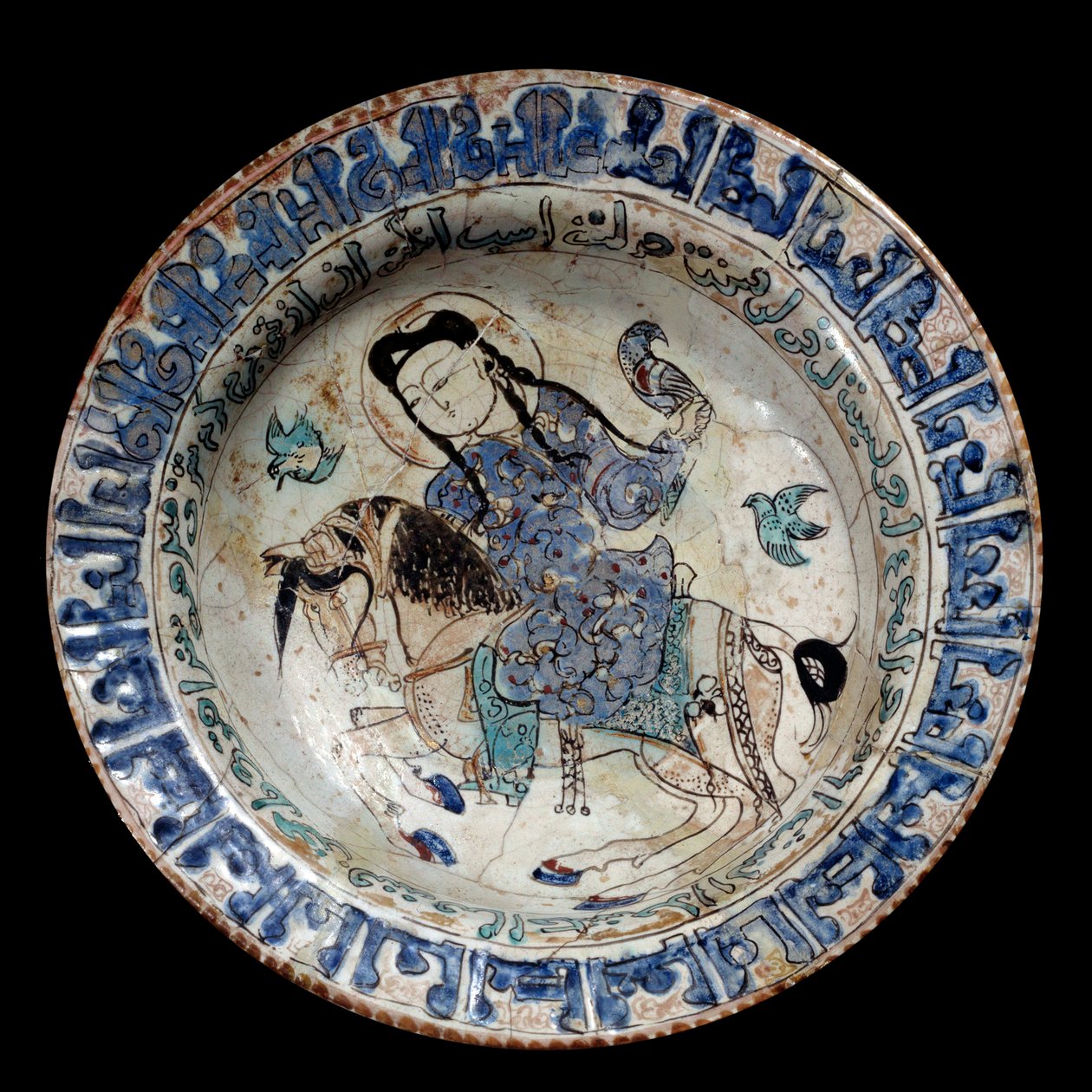 Islamic art: falconer rider dish in ceramic. The beginning of the 13th century. From Iran by Islamic School