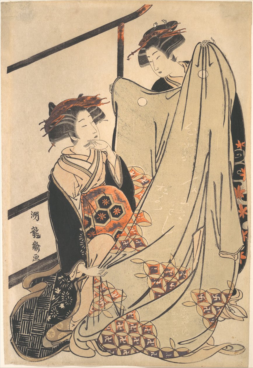 Two Beauties Looking at Kimono by Isoda Koryusai