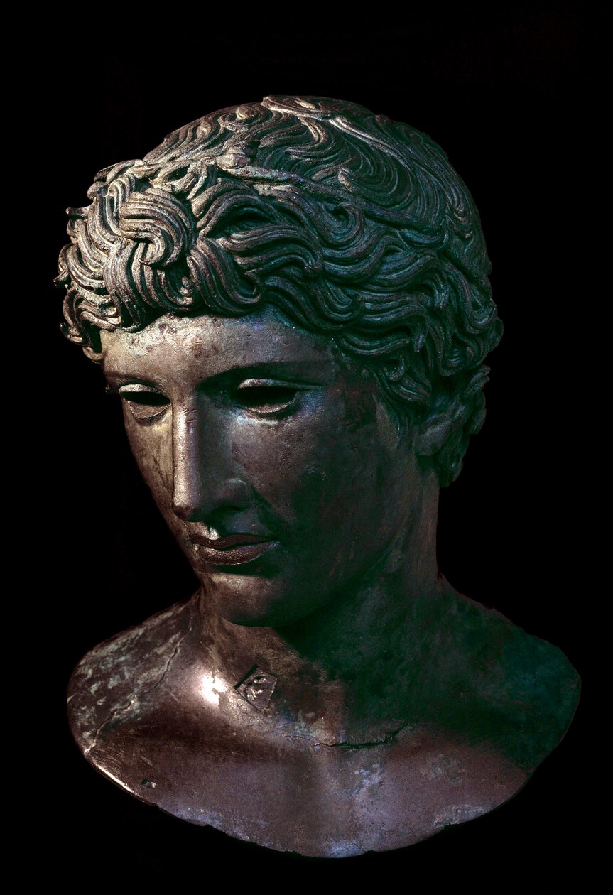 Bronze head of winner athlete wearing an olive crown. From Benevent, Italy. 5th century BC by Italian Peninsula