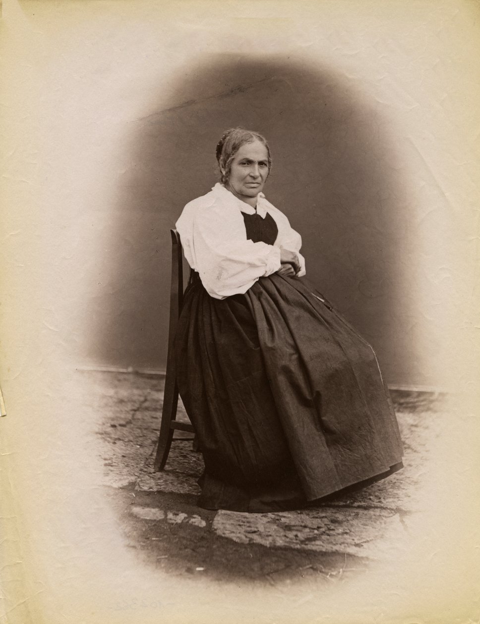 Elderly Woman Seated on Chair, Parre, Lombardy, Italy by Italian Photographer