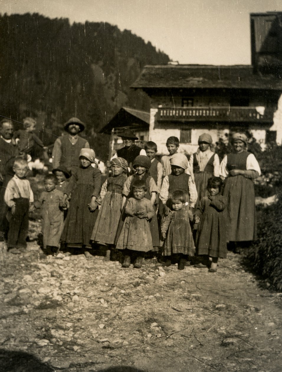 Family in front of house, Aosta Valley, Italy 1900-1910 by Italian Photographer