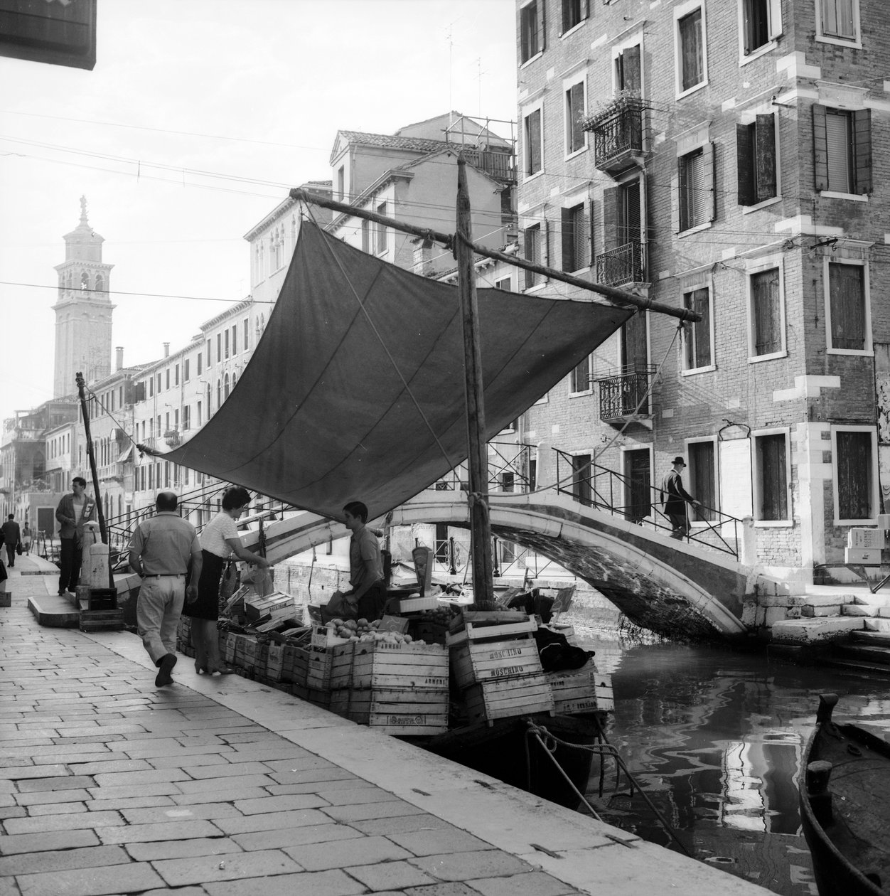 Sale of fruits and vegetables on board a boat in a canal, Venice by Italian Photographer