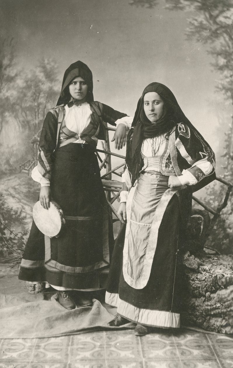 Two women wearing traditional clothes from Belvi and Aritzo, Sardinia, Italy, circa 1910 by Italian Photographer