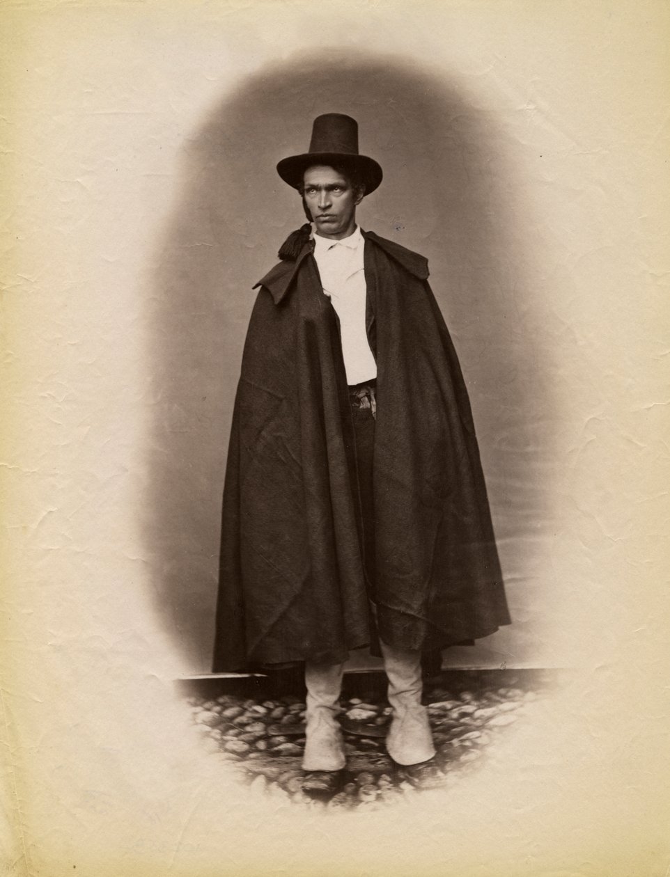 Young Man Wearing Cloak and Hat, Parre, Lombardy, Italy by Italian Photographer