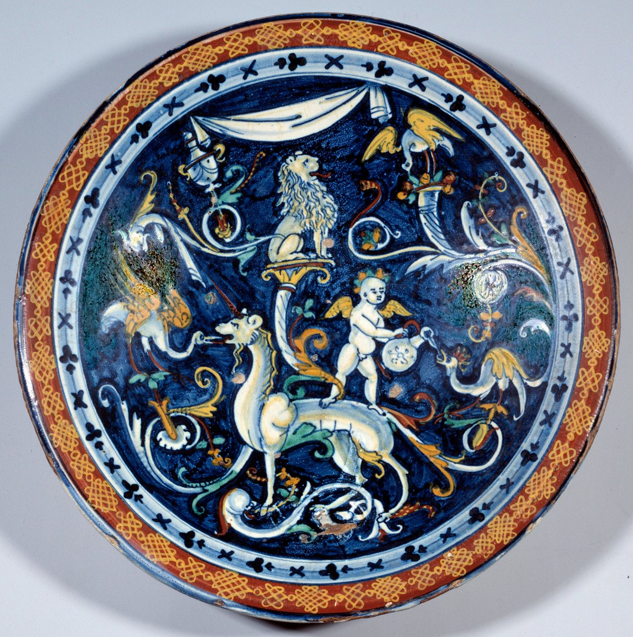 Cafaggiolo faience cup decorates fantastic animals by Italian School