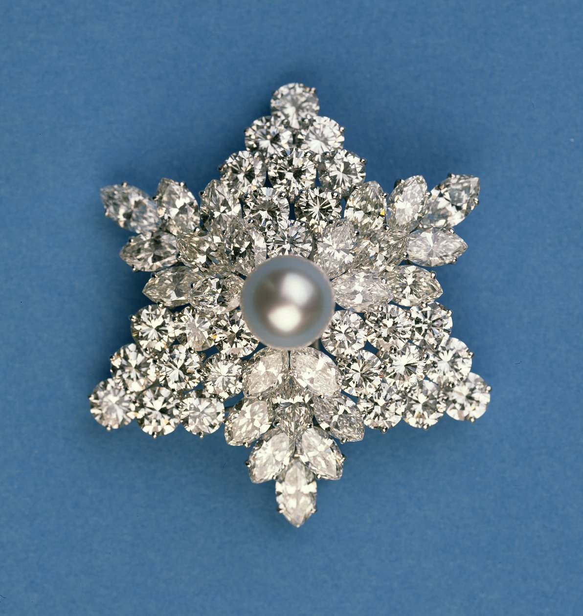 Circular and marquise diamond snowflake brooch by Bulgari by Italian School