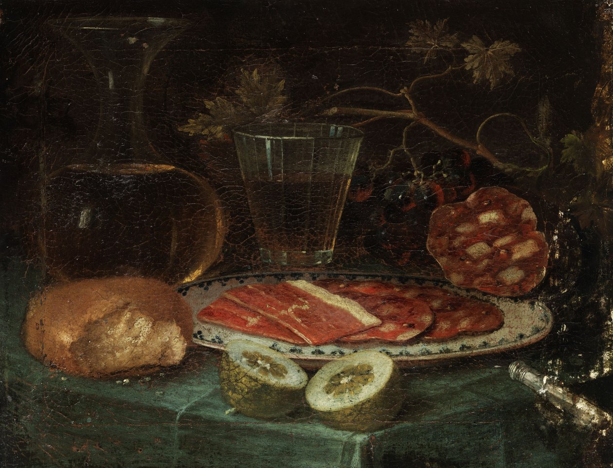 Still Life with Bread, Glass Carafe, Wine Glass, Plate with Ham and Sausage, Lemon, and Pearl-handled Knife by Italo flämischer Maler des 17. Jahrhunderts