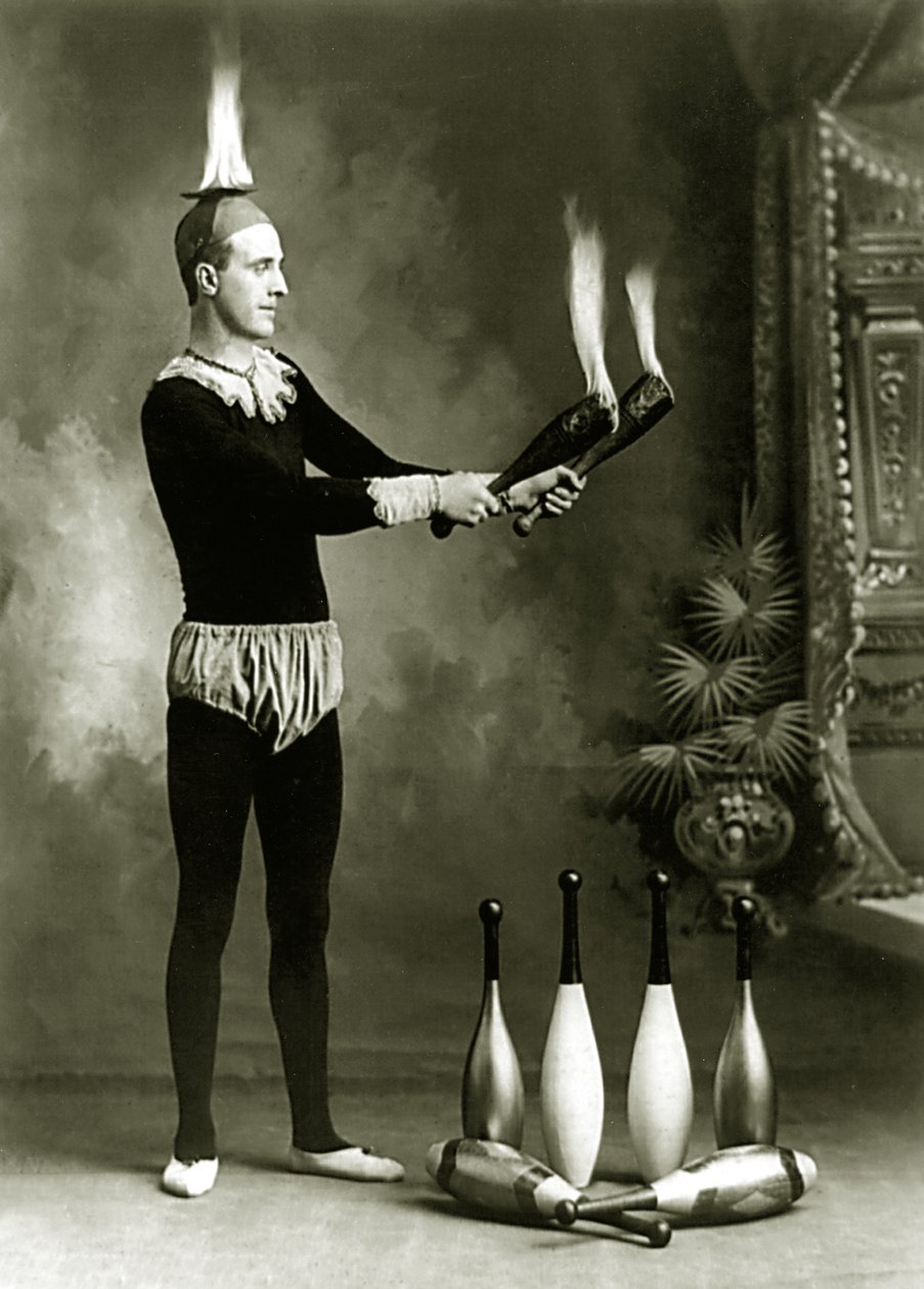 J.T. Doyle, Circus and Carnival Juggler with Flaming Pins and Bowl, c.1902 by J.E. Pasonault