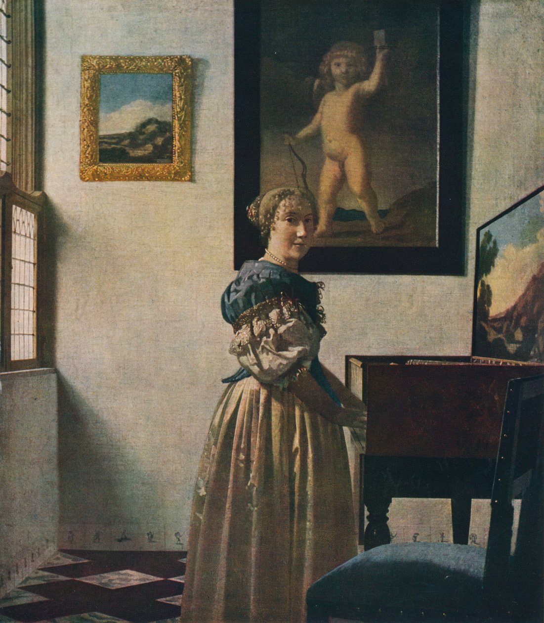 A Young Woman Standing at a Virginal by Jan Vermeer van Delft