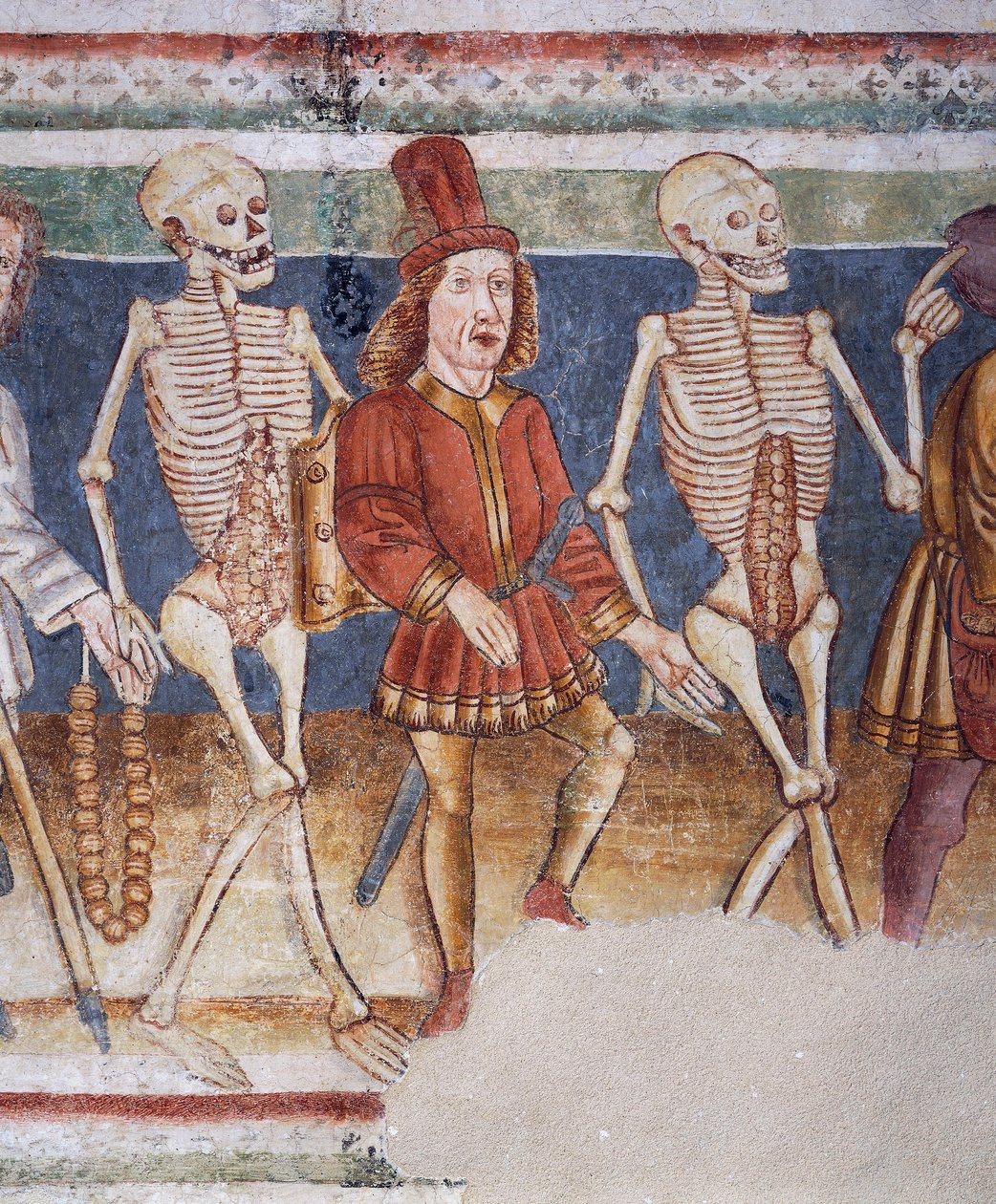 Hrastovlje Fortified Church, Trinity Church, Death Accompanying Merchant and Wealthy Banker, Dance of Death (detail) by Janez Kastav