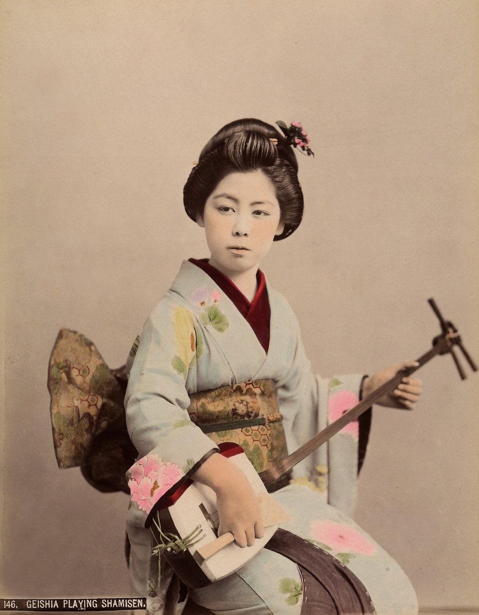 Portrait of a Geisha Playing the Shamisen by Japanese Photographer