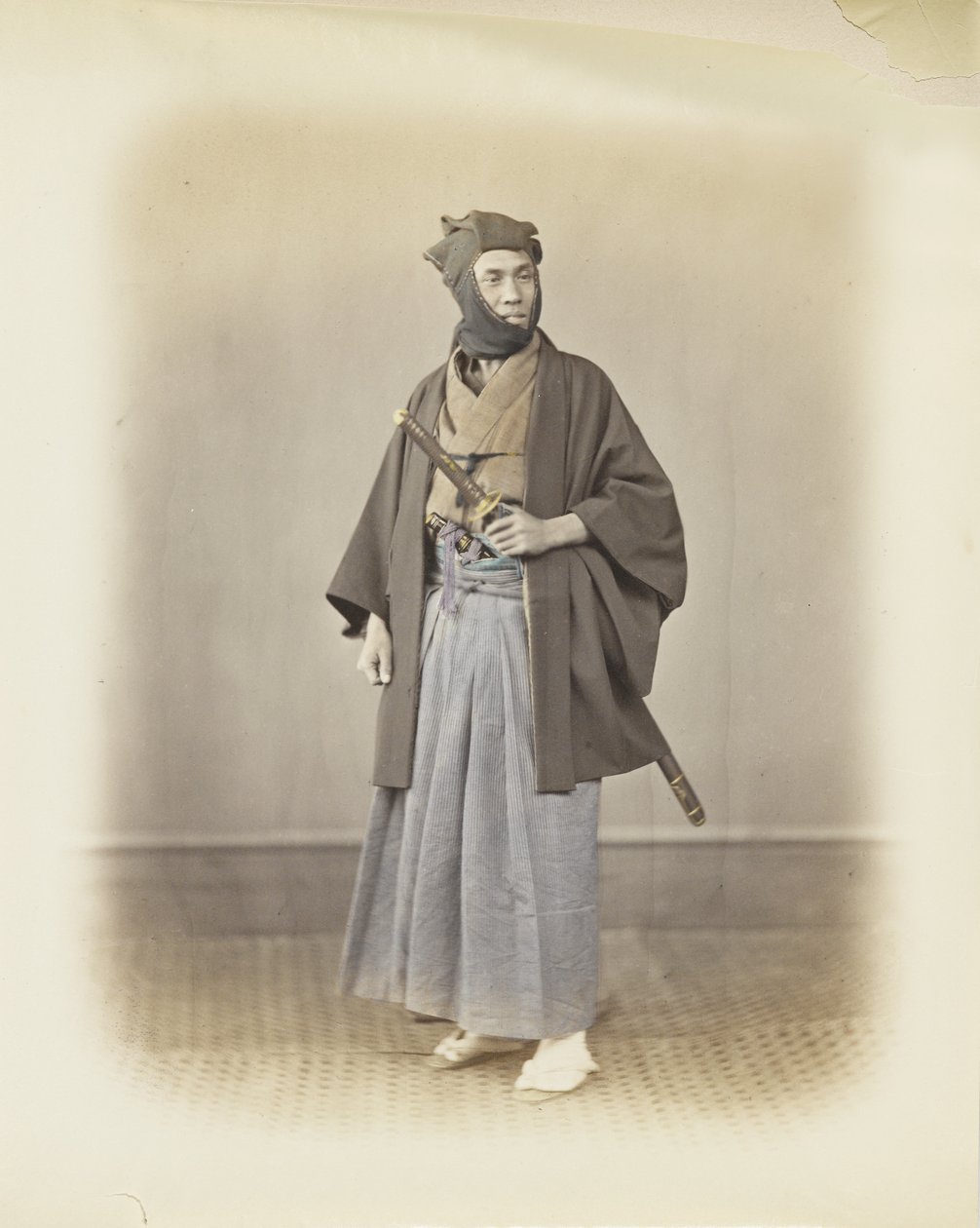 Japanese man in traditional dress by Japanese Photographer