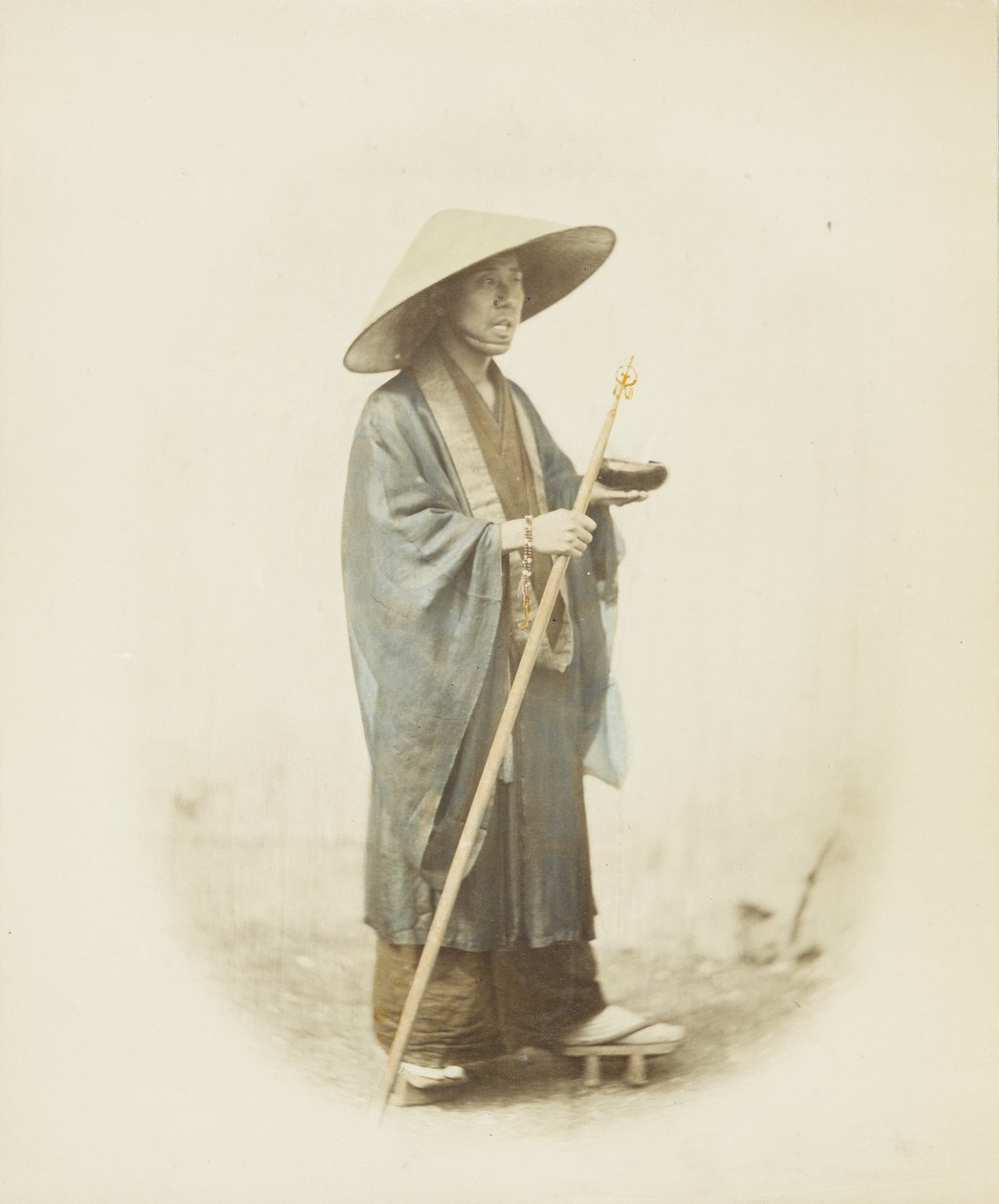 Japanese man in traditional dress by Japanese Photographer