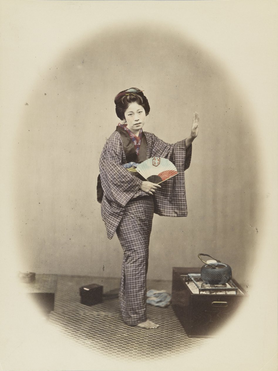 Japanese woman in traditional dress by Japanese Photographer