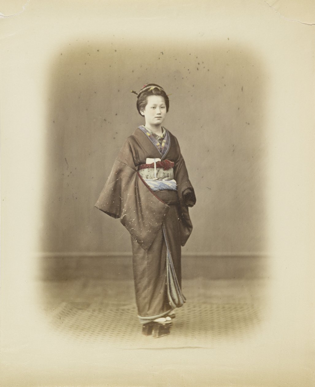 Japanese woman in traditional dress by Japanese Photographer