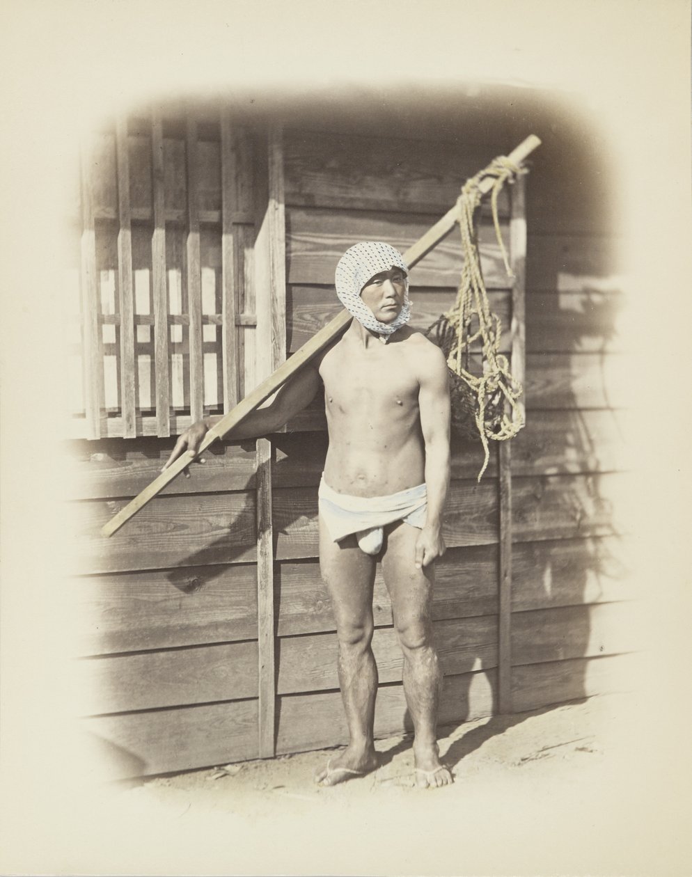 Man with fishing basket by Japanese Photographer