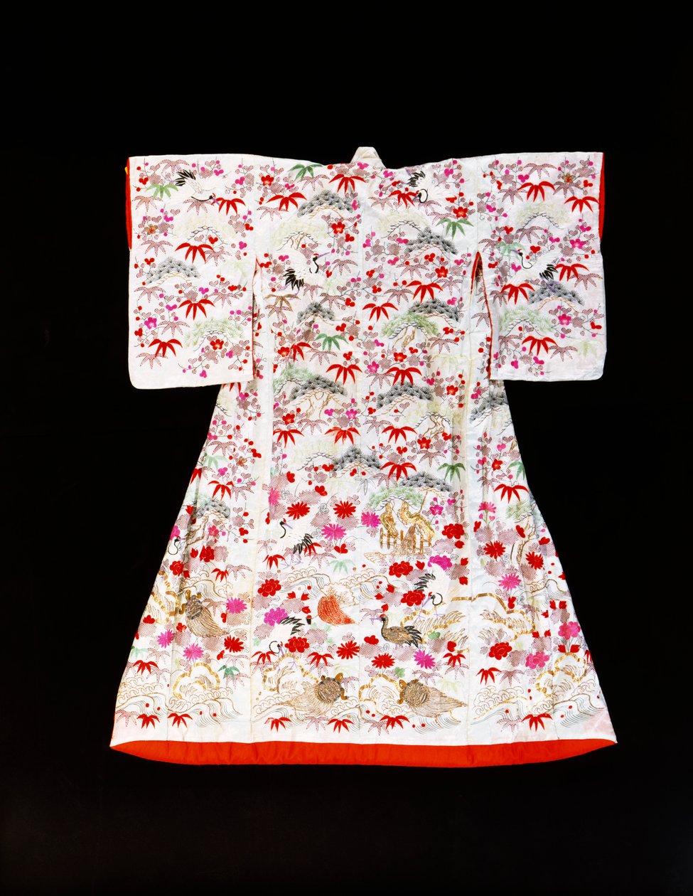 A furisode of white silk damask stencilled with bamboo leaves and plum blossom by Japanese School