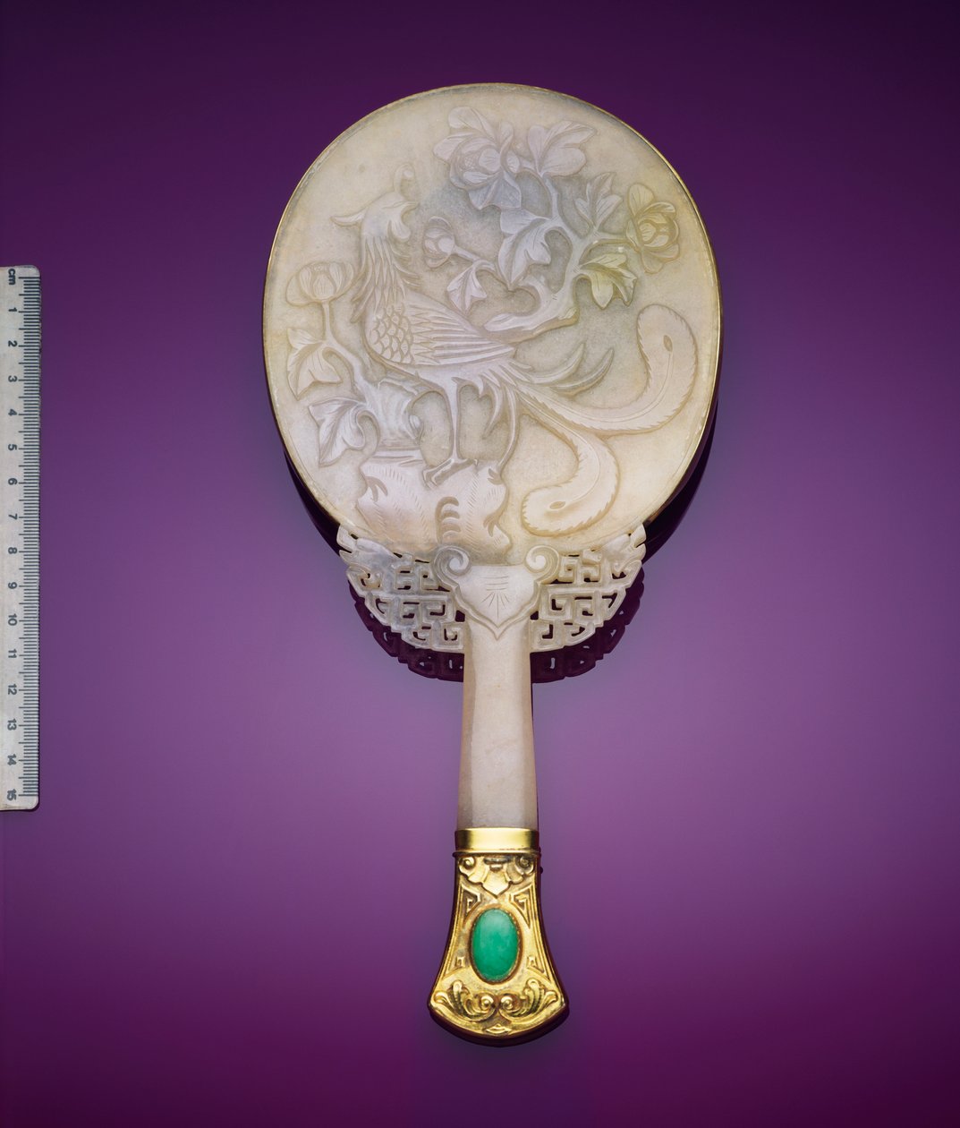 A White Jadeite and Gilt Silver Mirror with a Low Relief of a Phoenix and a Peony by Japanese School