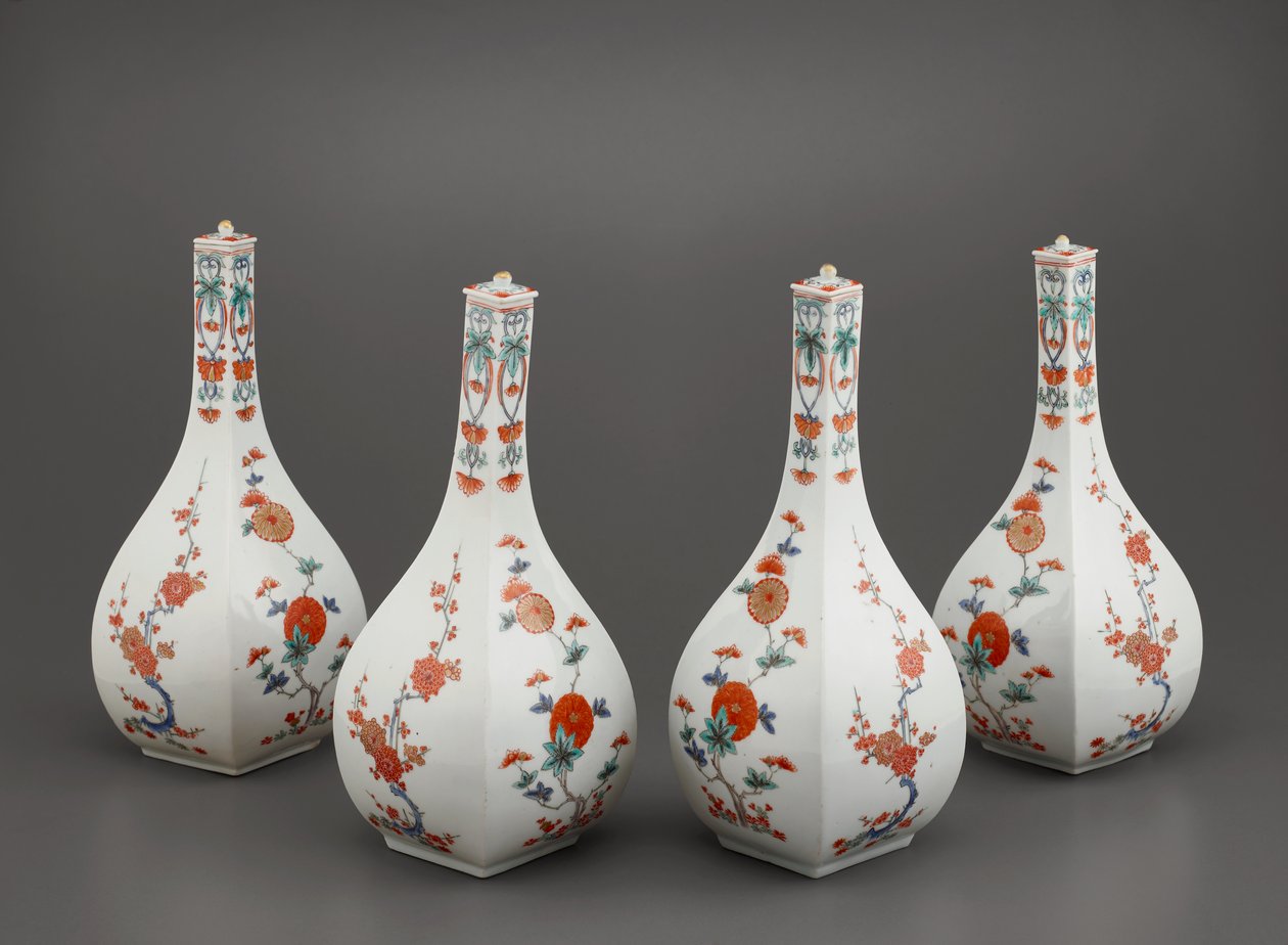 Four square bottles with lids by Japanese School