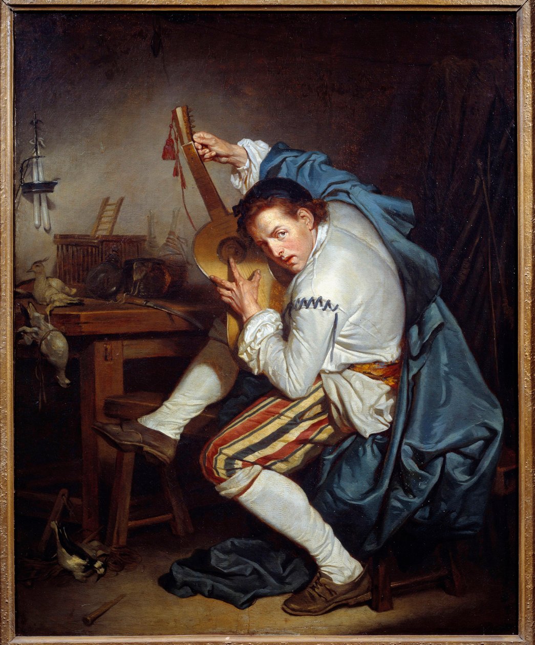 The guitarist, or a bird who, on return from hunting, tunes his guitar by Jean Baptiste Greuze