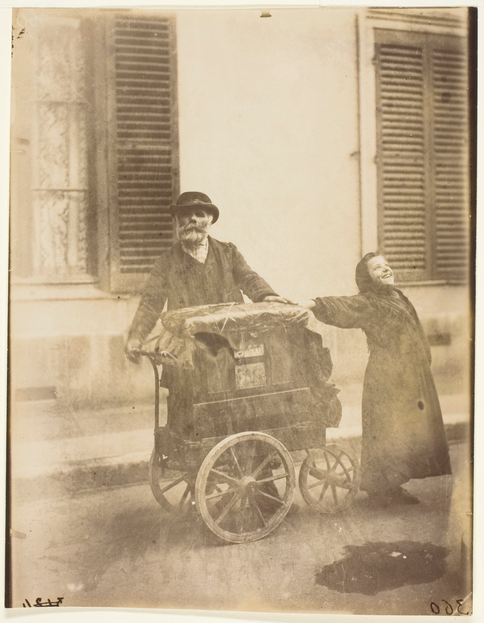 Organ Player by Jean Eugène Auguste Atget