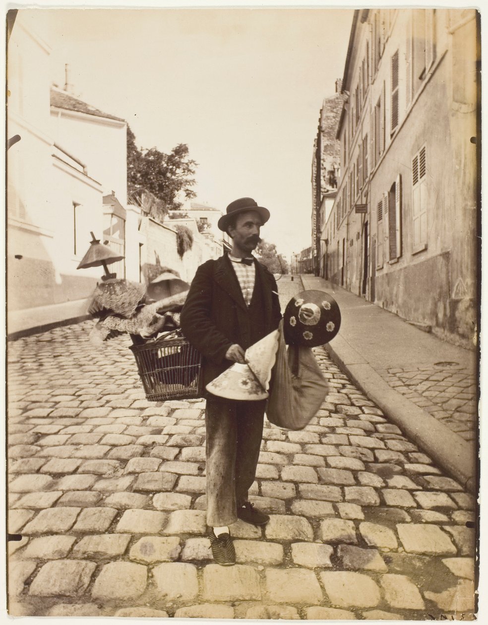 Lampshade Merchant by Jean Eugène Auguste Atget