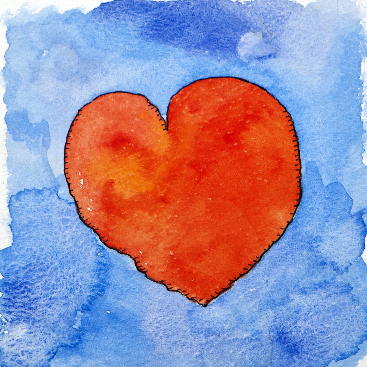 Red heart on blue by Jennifer Abbott