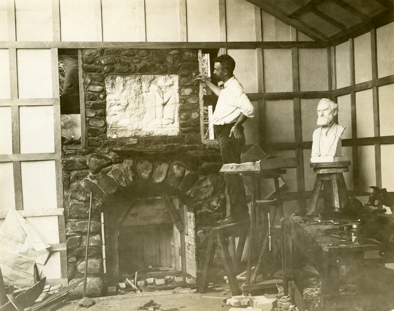 Karl Bitter (sculptor) building his fireplace himself by Jessie Tarbox Beals
