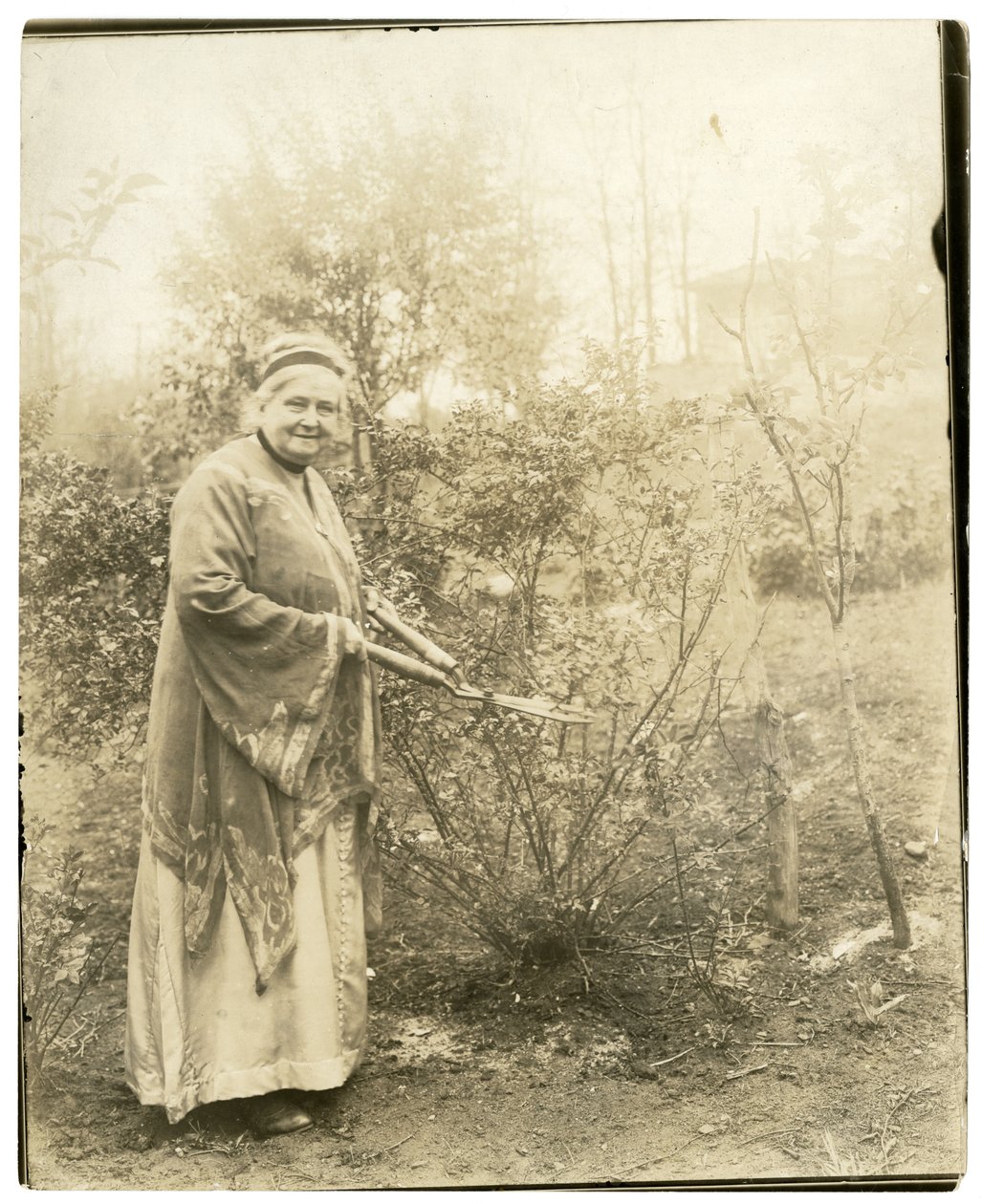 Mrs Alzirc Hewitt Wade - 88 years old - in the garden at Ossining, NY, c.1905-28 by Jessie Tarbox Beals