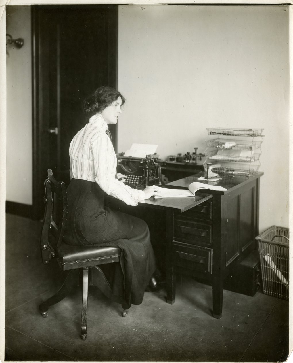 Model with typewriter, c.1905-18 by Jessie Tarbox Beals