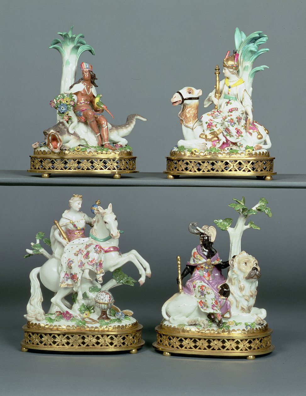 Four Meissen groups representing the Four Continents mounted with Louis XVI ormolu, modelled by Johann Joachim Kandler, mid 18th century by Johann Joachim Kaendler