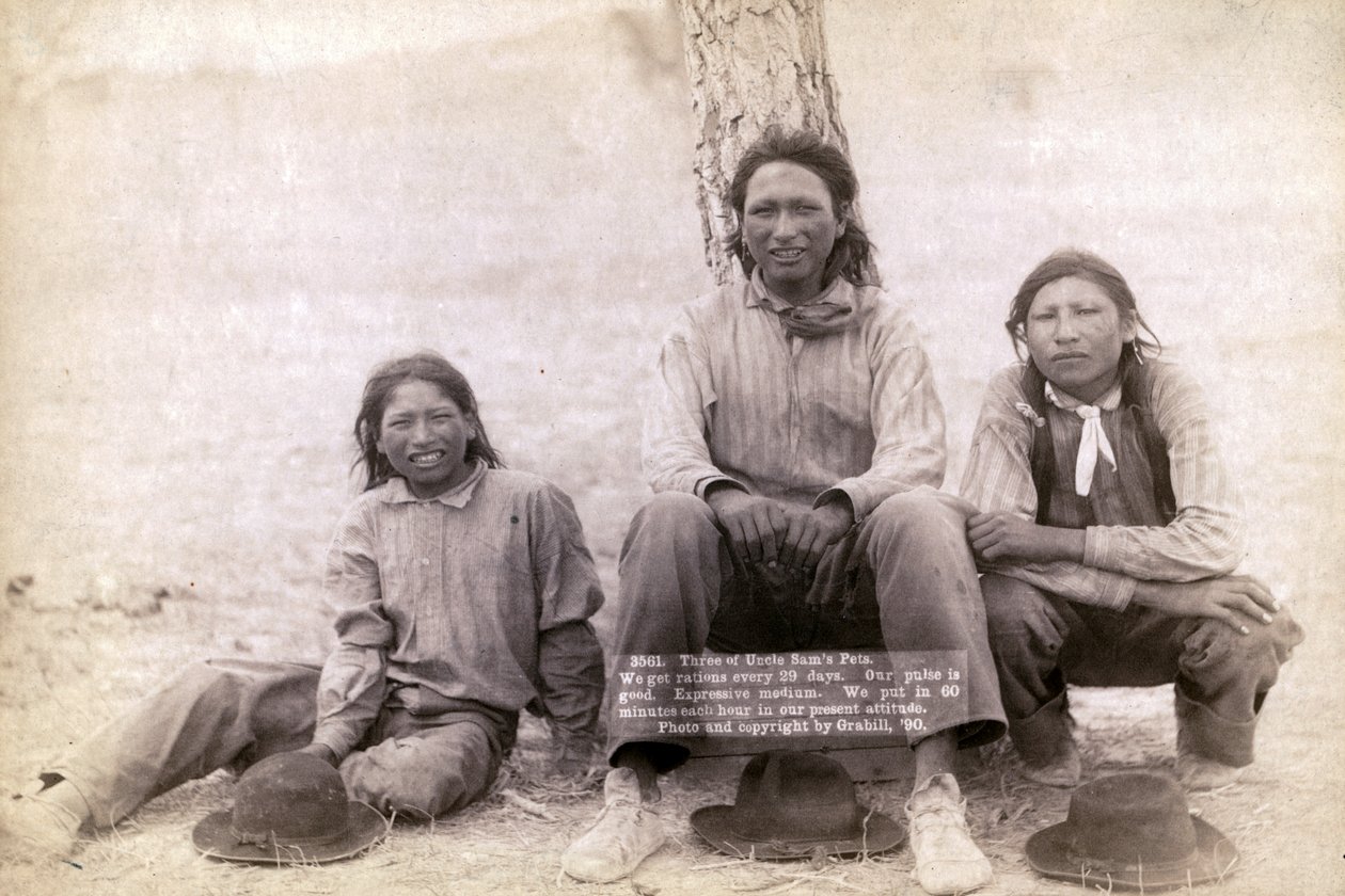 Three Lakota Teenage Boys in Western Clothing, 1891 by John C. H. Grabill