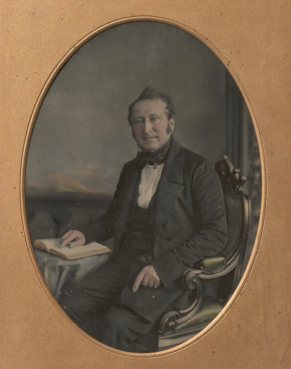 Seated Man Pointing to a Passage in an Open Book by John Jabez Edwin Mayall