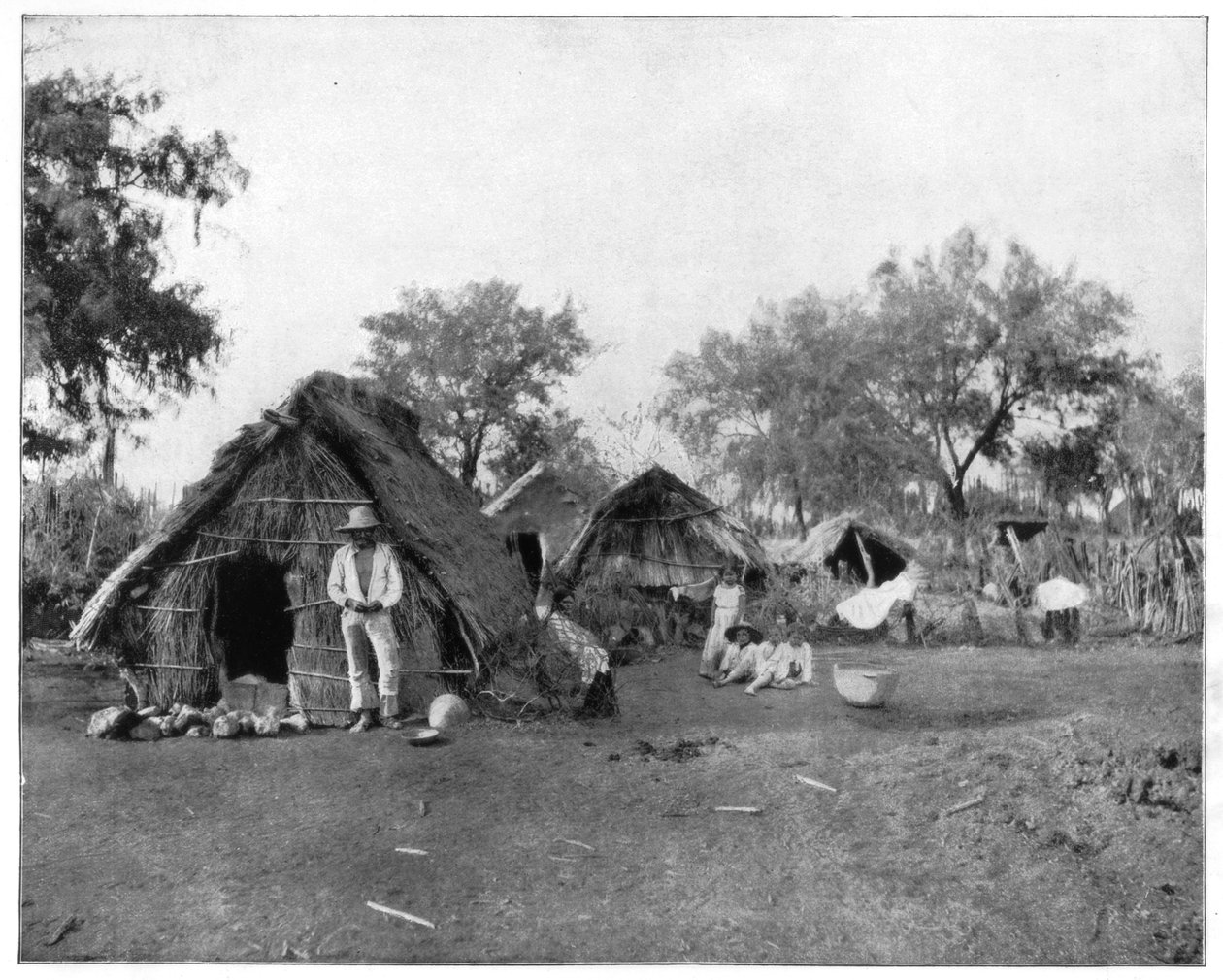 Straw cottages, Salamanca, Mexico, late 19th century by John L. Stoddard