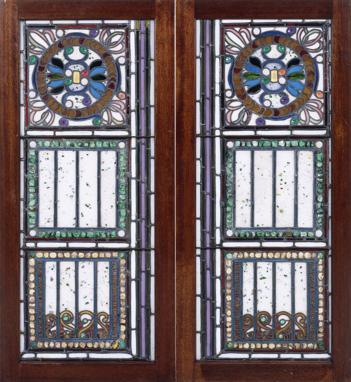 A pair of leaded glass windows by John La Farge or Lafarge