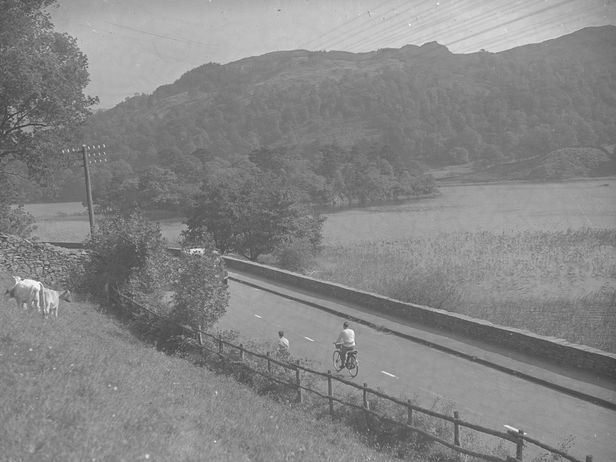 View of a Road Running Alongside Rydal Water, Includes People on Bikes, Cattle and Fells by Joseph Hardman